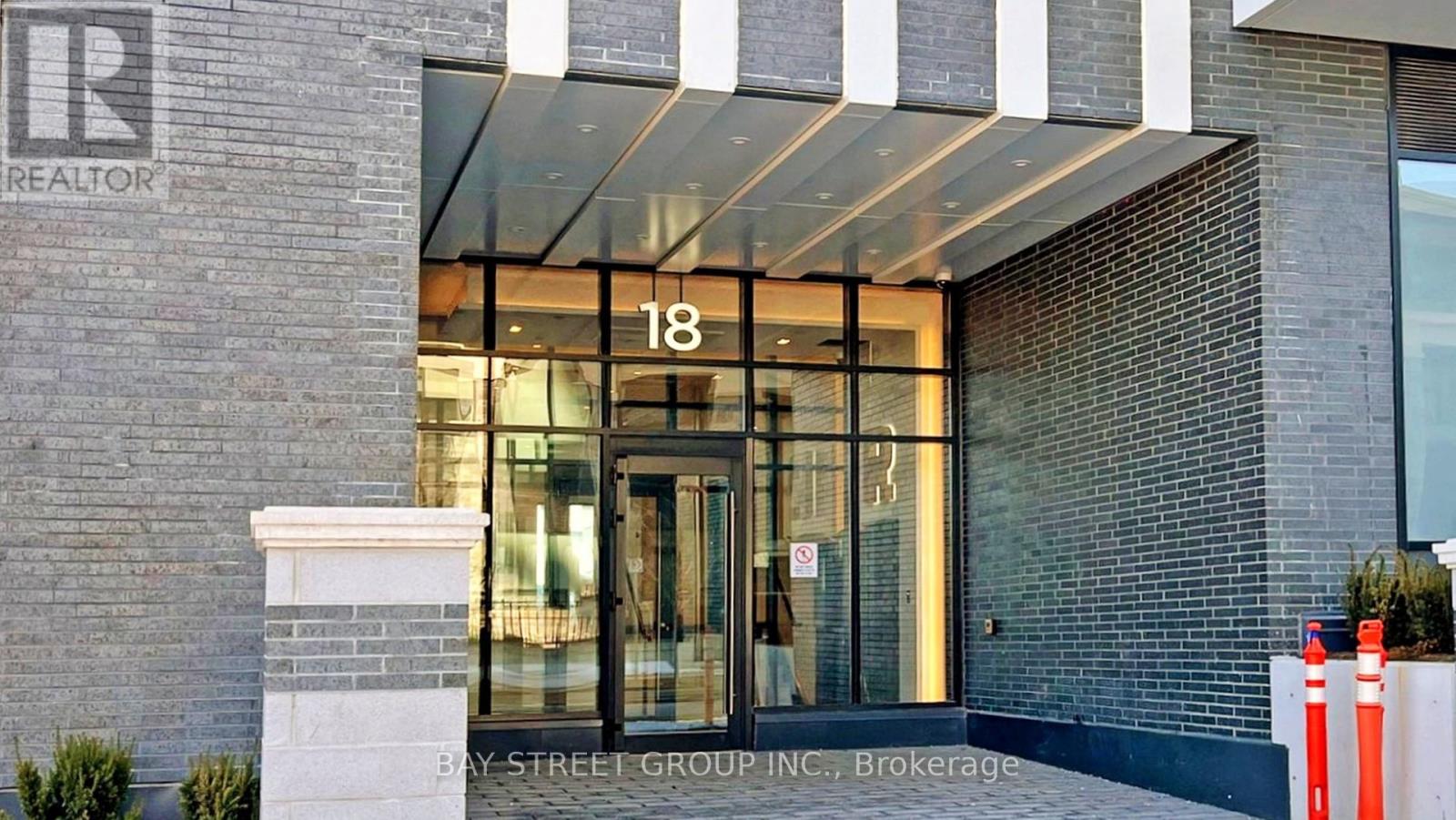 202 - 18 Water Walk Drive, Markham (Unionville), Ontario  L3R 6L5 - Photo 6 - N12885478