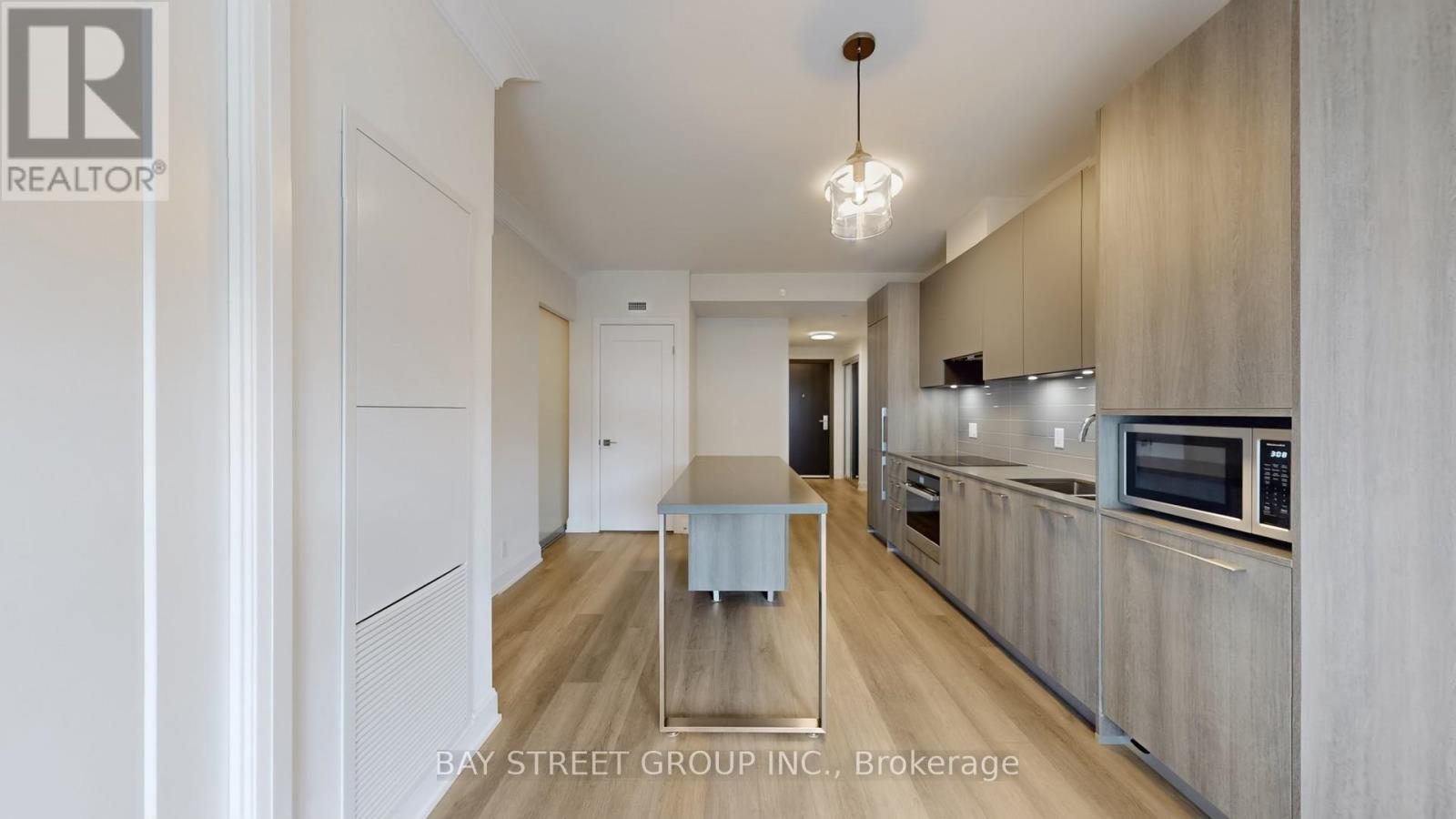 202 - 18 Water Walk Drive, Markham (Unionville), Ontario  L3R 6L5 - Photo 7 - N12885478