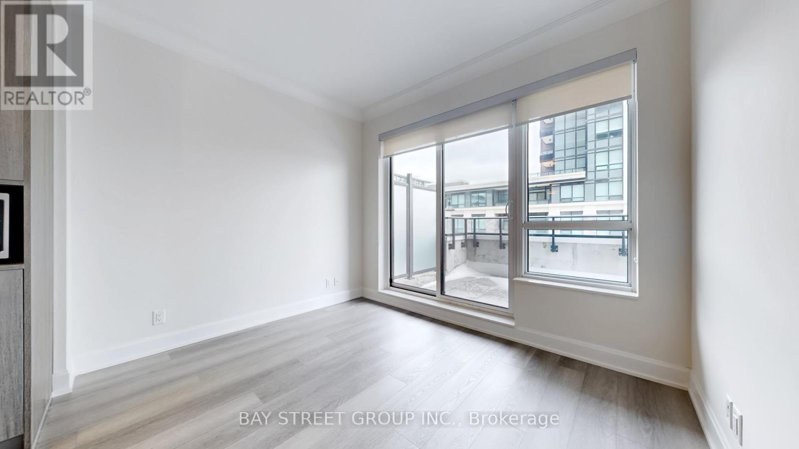 202 - 18 Water Walk Drive, Markham (Unionville), Ontario  L3R 6L5 - Photo 9 - N12885478