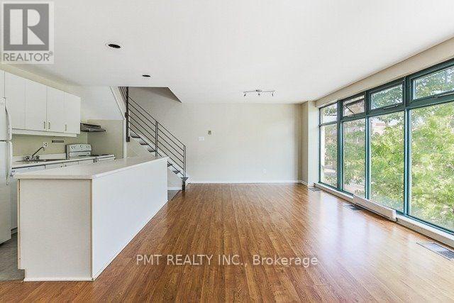 1 - 2064 Queen Street E, Toronto, Ontario  M4E 1C9 - Photo 2 - E12885876