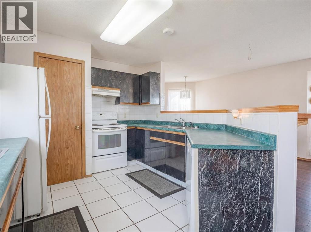 206 Saratoga Close Ne, Calgary, Alberta  T1Y 7A1 - Photo 7 - A2287199