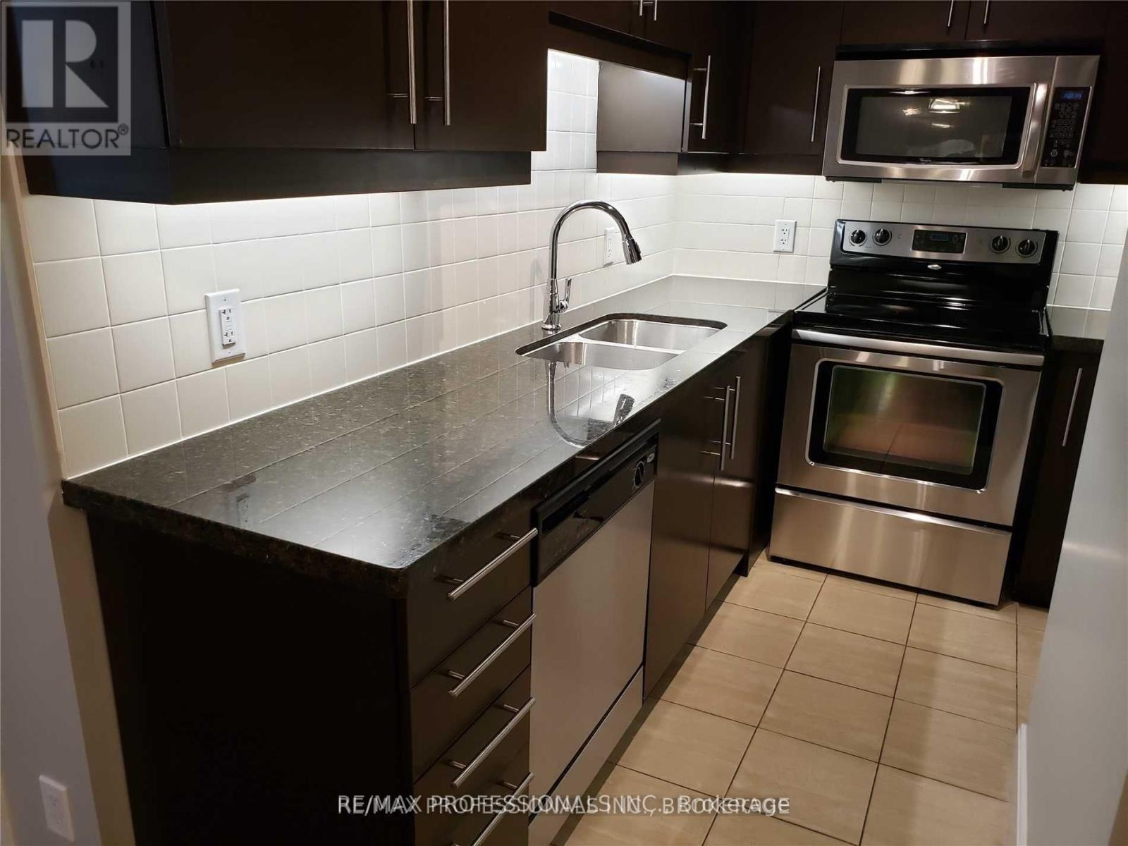 1902 - 50 Absolute Avenue, Mississauga (City Centre), Ontario  L4Z 0A9 - Photo 3 - W12886306