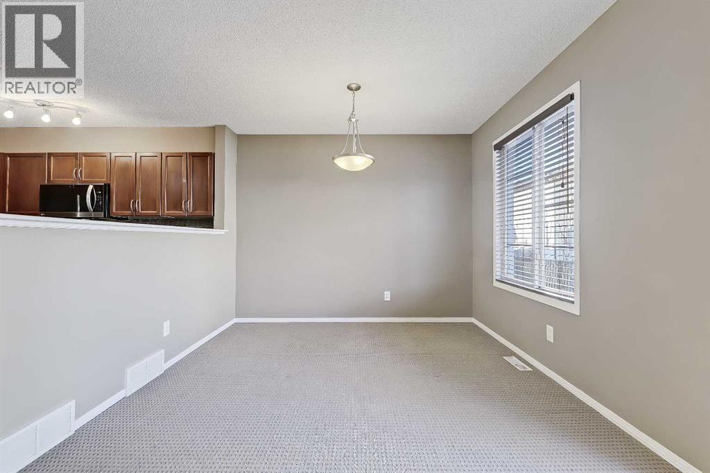 161 Eversyde Common Sw, Calgary, Alberta  T2Y 4Z5 - Photo 9 - A2285414
