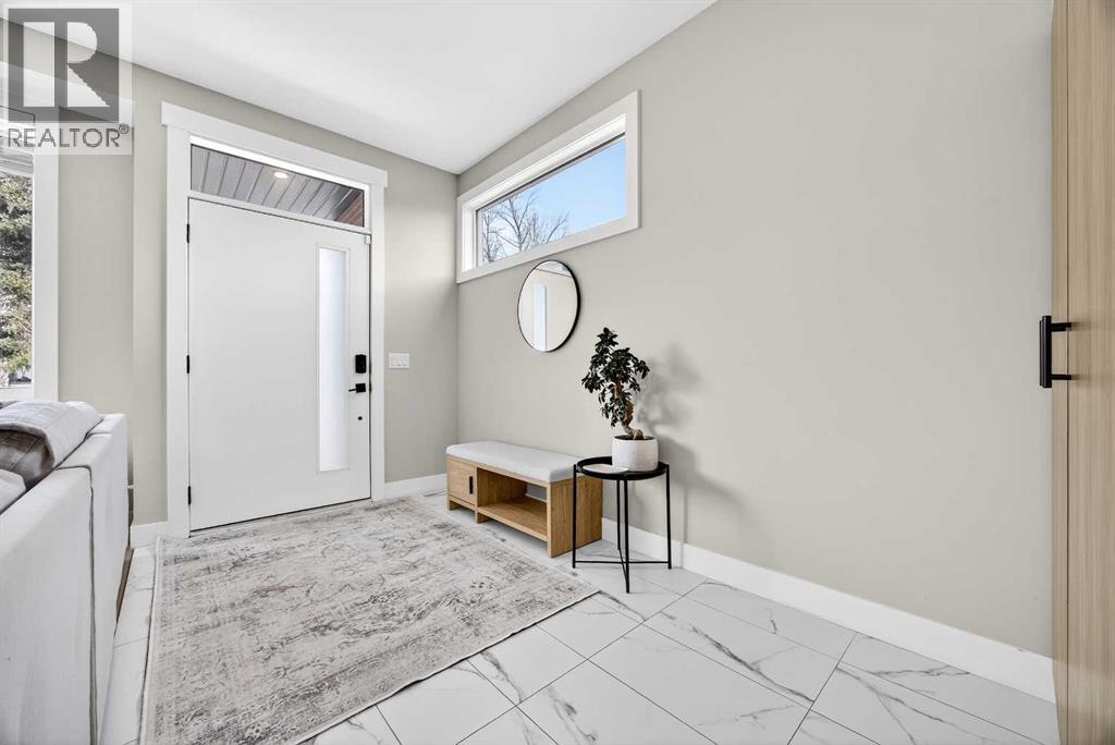 54 Heston Street Nw, Calgary, Alberta  T2K 2C1 - Photo 2 - A2293172