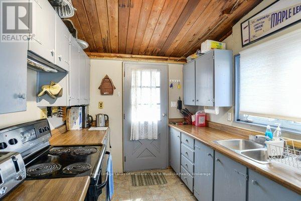 709 Harrison Trail, Georgian Bay (Freeman), Ontario  L0K 1S0 - Photo 11 - X12886940
