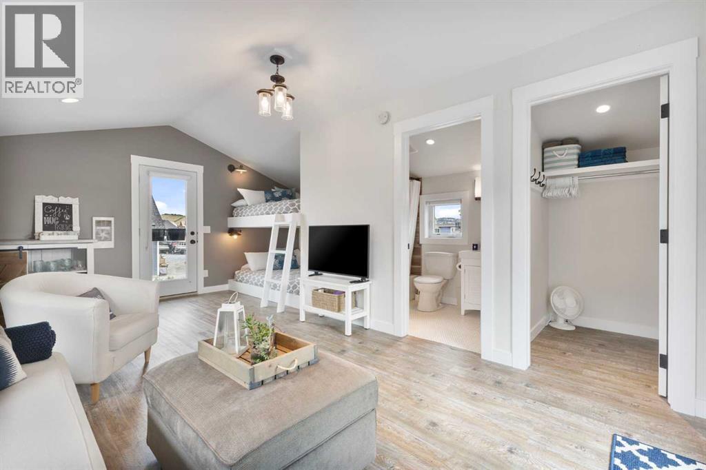 332 Cottageclub Way, Rural Rocky View County, Alberta  T4C 1C3 - Photo 29 - A2293703