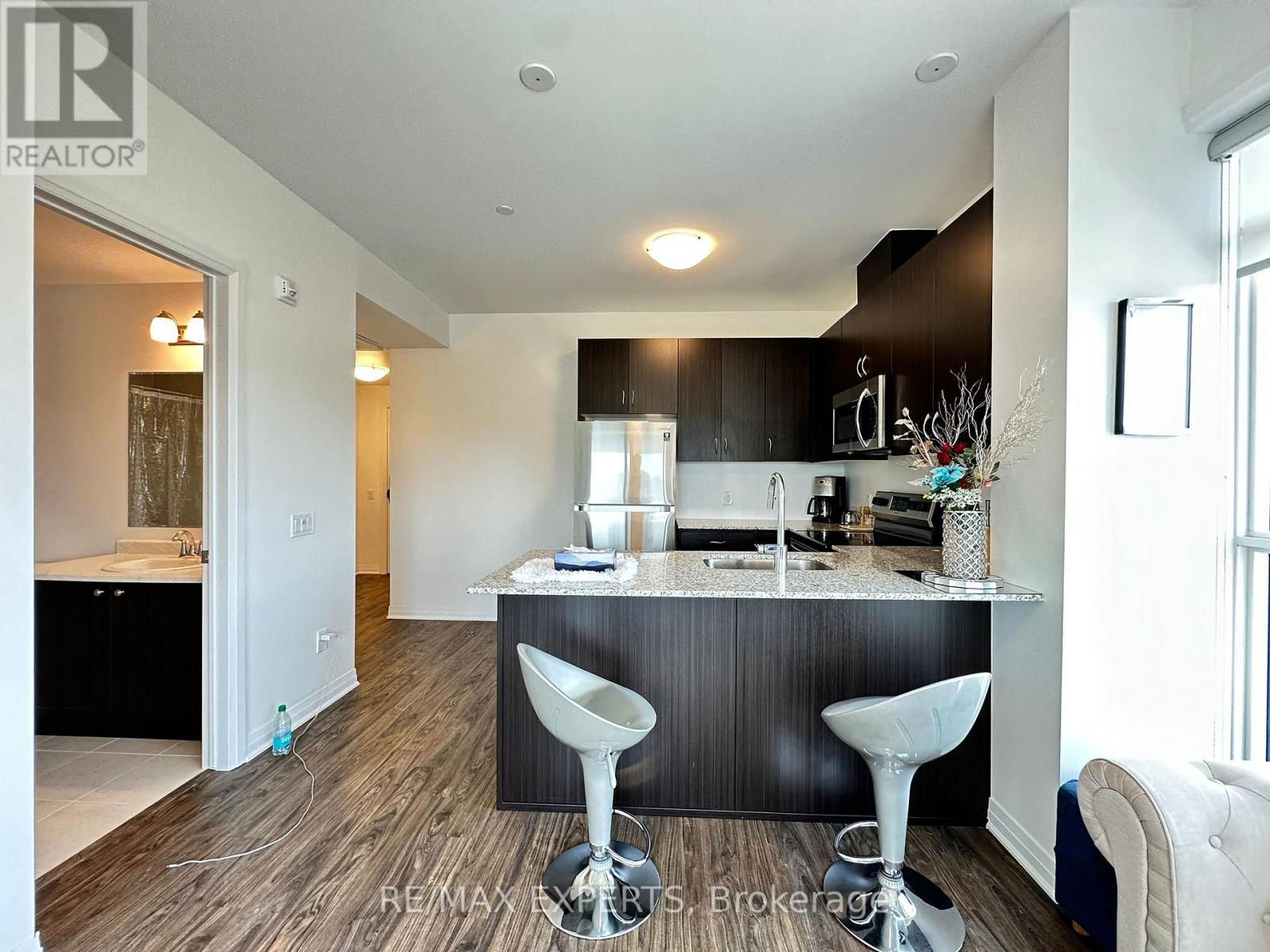 206 - 95 Dundas Street W, Oakville (Go Glenorchy), Ontario  L6M 5N4 - Photo 15 - W12887344