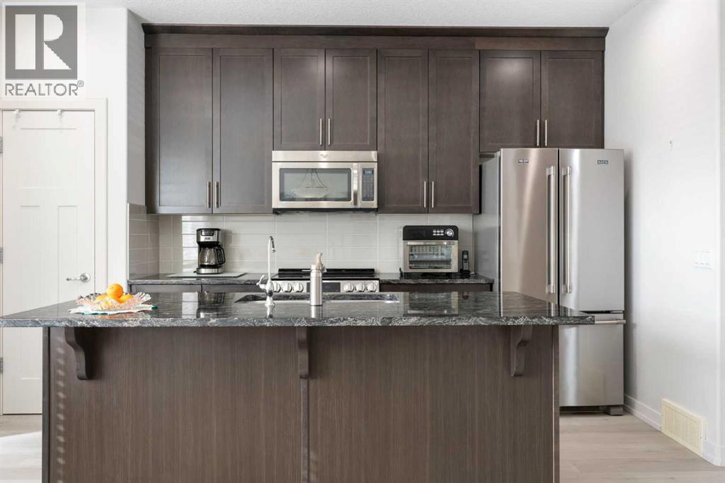 167 Fireside Drive, Cochrane, Alberta T4C 0X4 - Photo 15 - A2284229