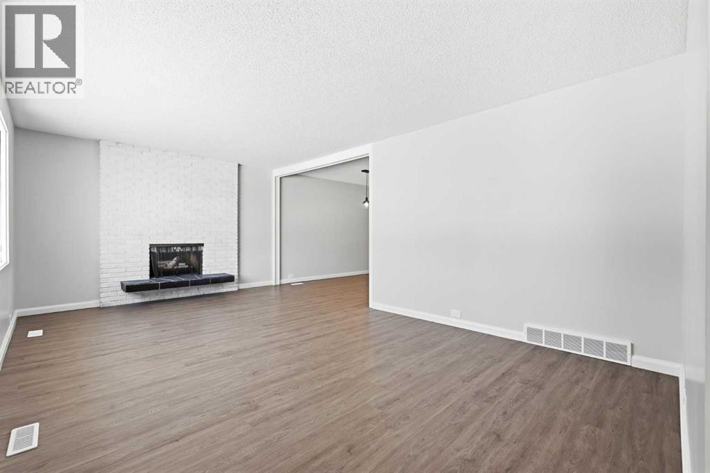 5031 Vienna Drive Nw, Calgary, Alberta  T3A 0W8 - Photo 5 - A2288045