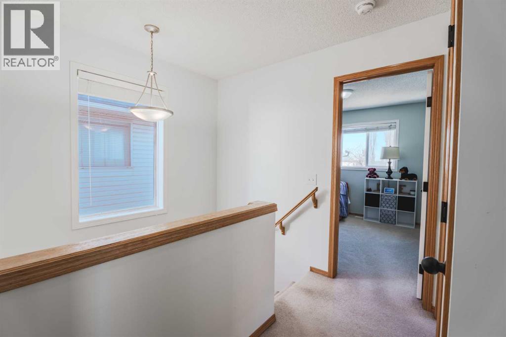 68 Bridleridge Gardens Sw, Calgary, Alberta  T2Y 4C9 - Photo 13 - A2287128