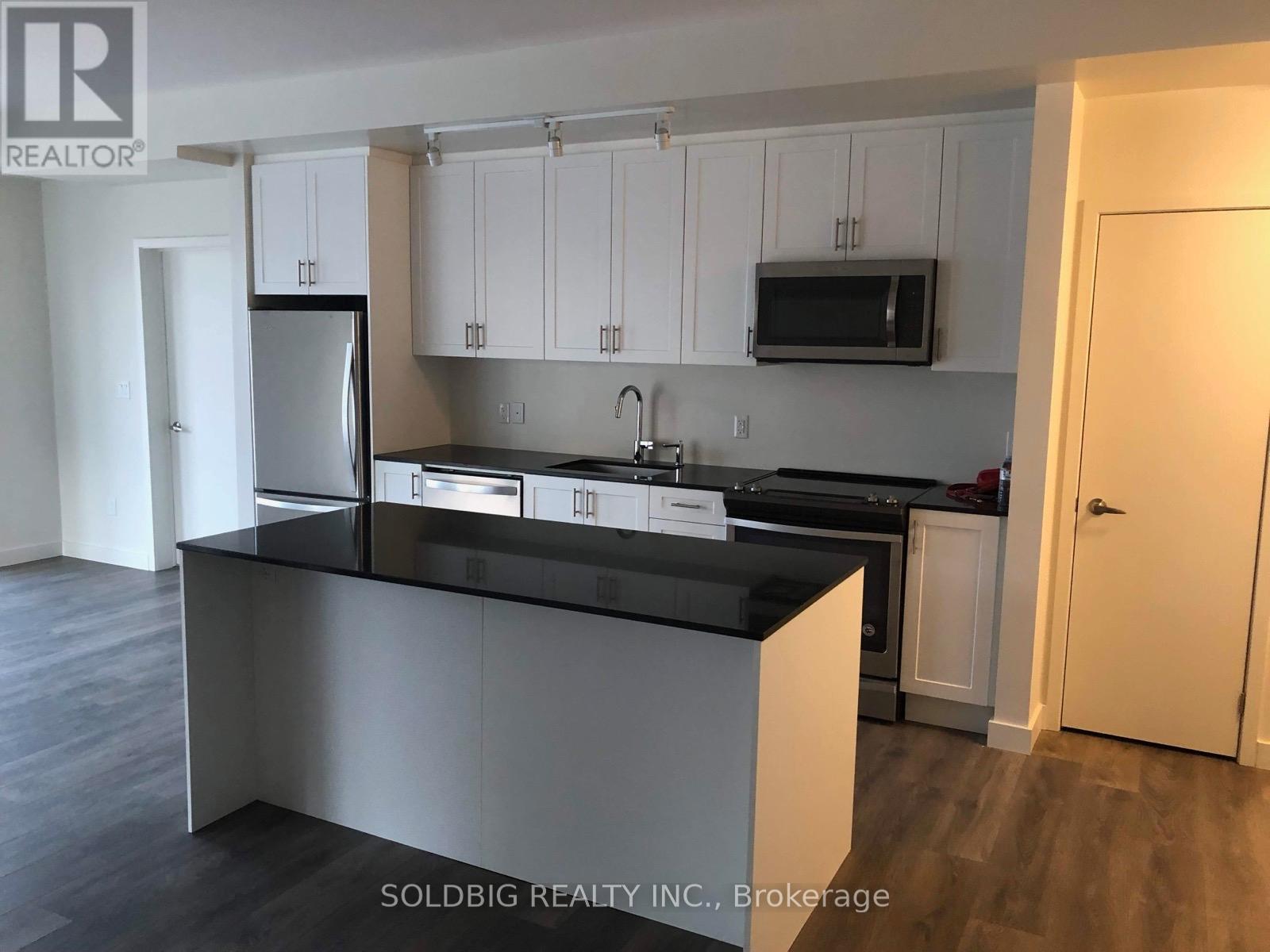 114 - 168 Sabina Drive, Oakville, Ontario  L6H 0W5 - Photo 2 - W12863528