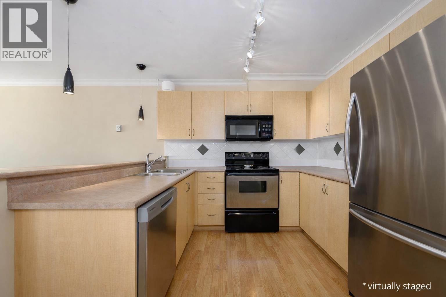 201 128 W 21st Street, North Vancouver, British Columbia  V7M 1Y9 - Photo 6 - R3100116