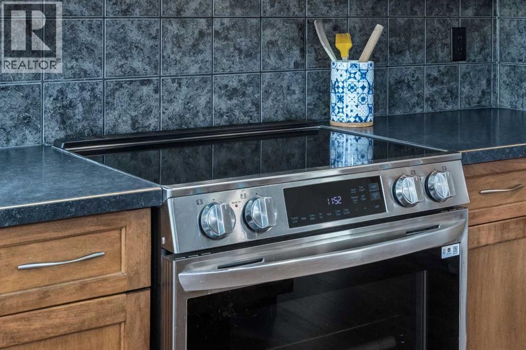 227 Tuscany Glen Park Nw, Calgary, Alberta  T3L 3E5 - Photo 9 - A2278231