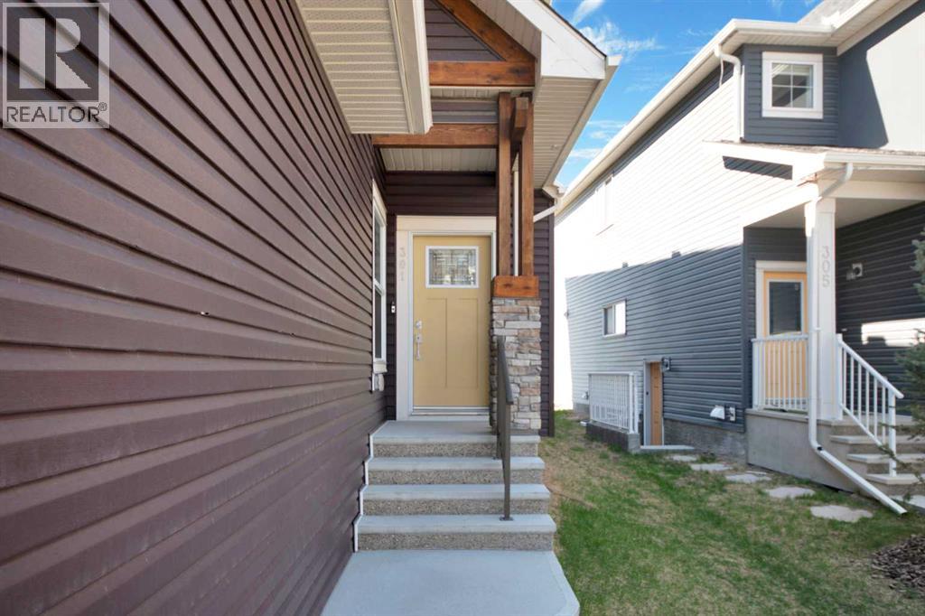 301 Sage Meadows Park Nw, Calgary, Alberta  T3P 1P6 - Photo 2 - A2276217
