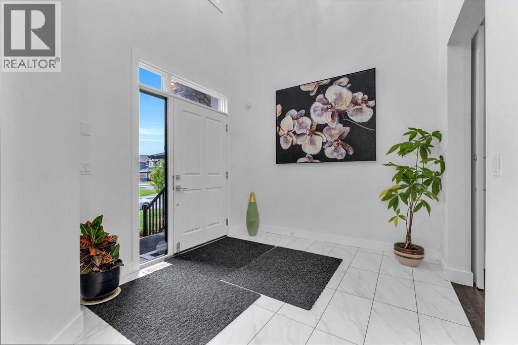 205 Kinniburgh Cove, Chestermere, Alberta  T1X 0Y6 - Photo 4 - A2291809