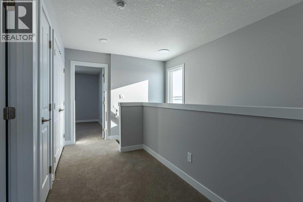 7 Heritage Point, Cochrane, Alberta  T4C 3K7 - Photo 14 - A2291321
