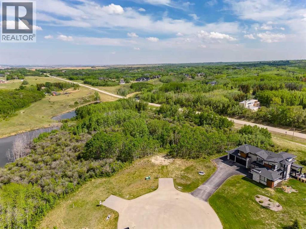 113 Silverhorn Ridge, Rural Rocky View County, Alberta  T3R 0X3 - Photo 3 - A2264296