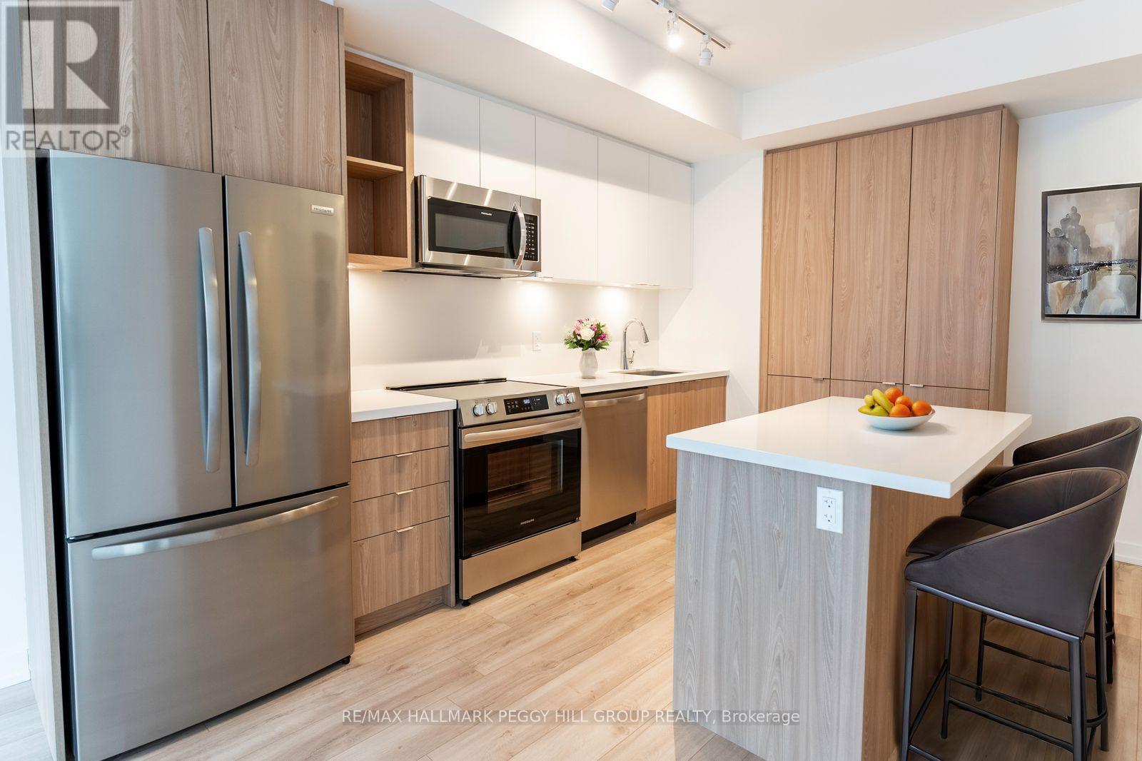 406 - 333 Sunseeker Avenue, Innisfil, Ontario  L9S 0R6 - Photo 2 - N12888770