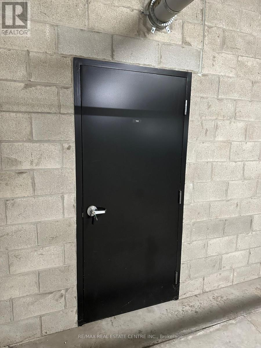 107 - 1210 Main Street E, Milton (De Dempsey), Ontario  L9T 9K8 - Photo 4 - W12888814