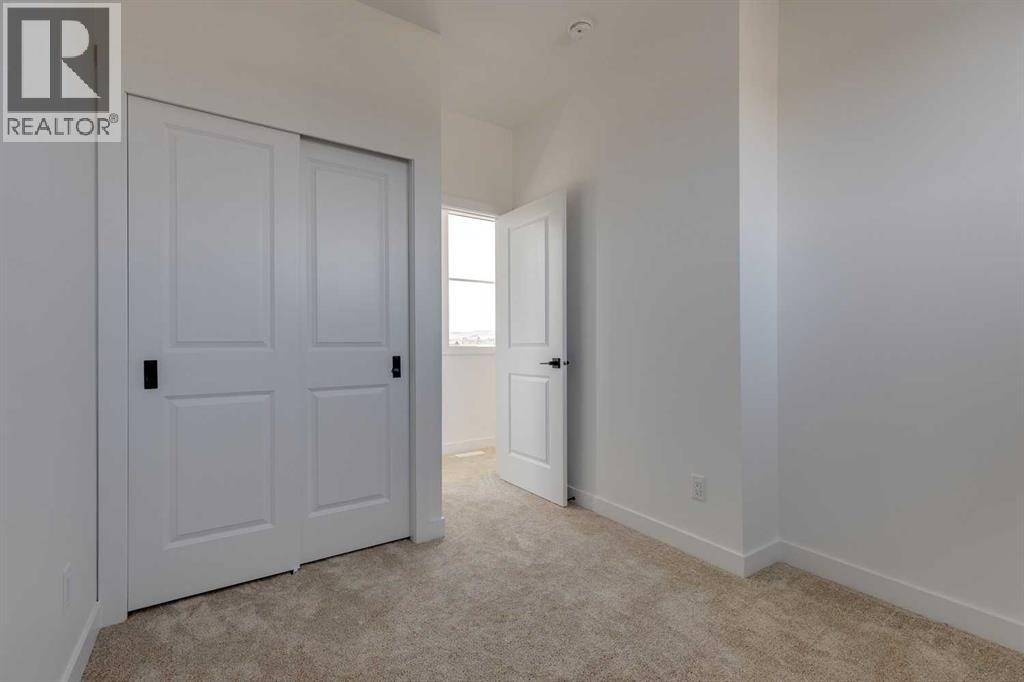 640 Cottageclub Bend, Rural Rocky View County, Alberta  T4C 1B1 - Photo 14 - A2293453