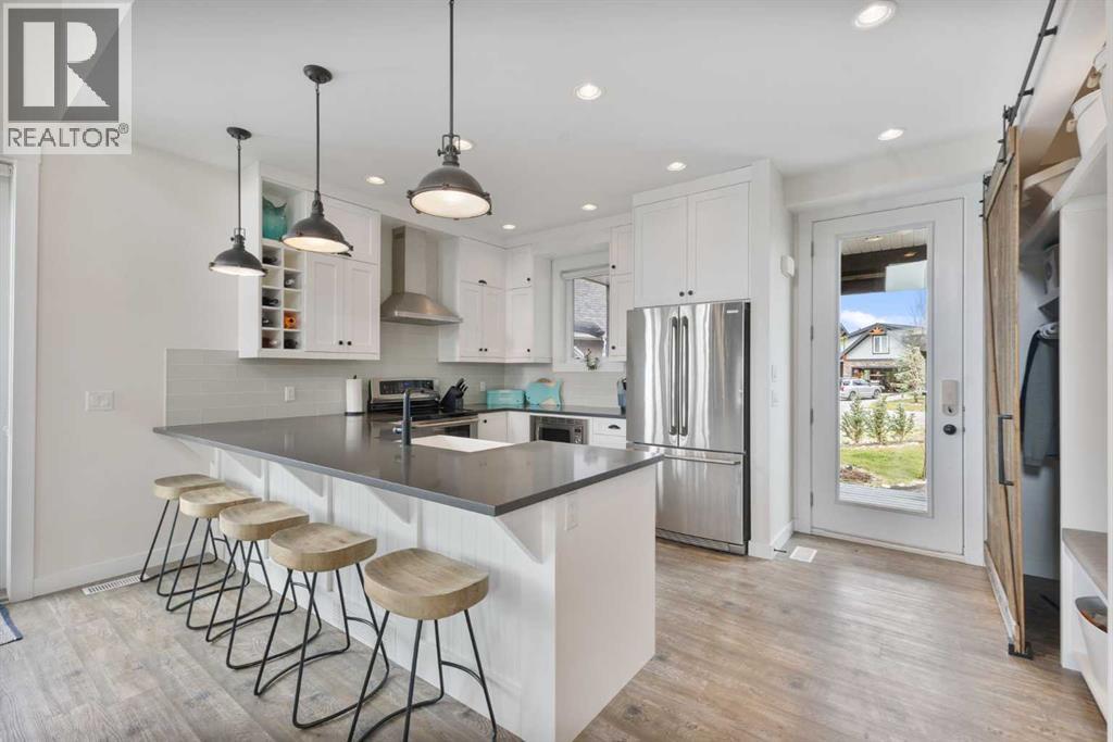 332 Cottageclub Way, Rural Rocky View County, Alberta  T4C 1C3 - Photo 4 - A2293703