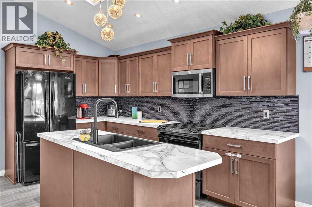 301 Mcleod Crescent, Diamond Valley, Alberta  T0L 2A0 - Photo 5 - A2290530