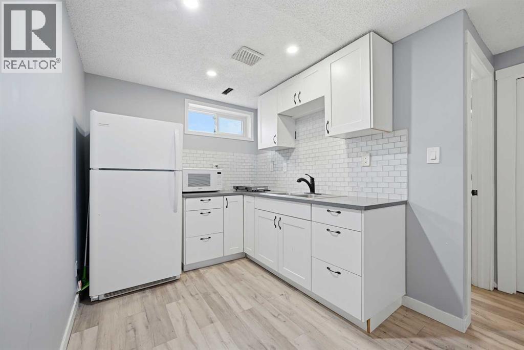 128 Ridgegate Way Sw, Airdrie, Alberta  T4B 1A9 - Photo 17 - A2293079