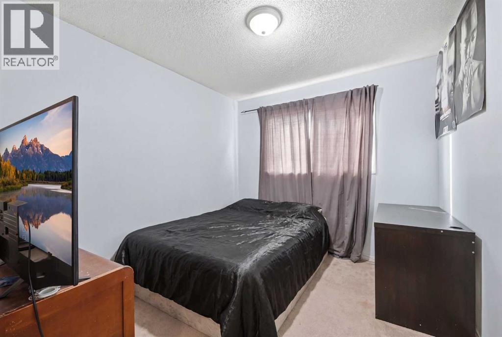 128 Ridgegate Way Sw, Airdrie, Alberta  T4B 1A9 - Photo 9 - A2293079