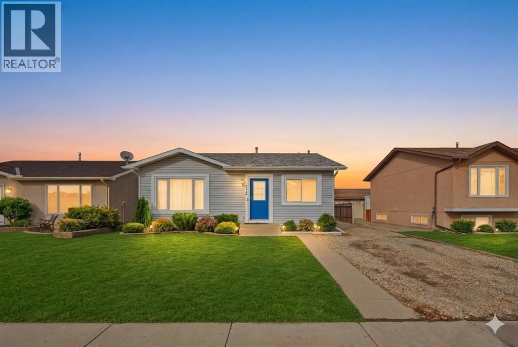 128 Ridgegate Way Sw, Airdrie, Alberta  T4B 1A9 - Photo 1 - A2293079