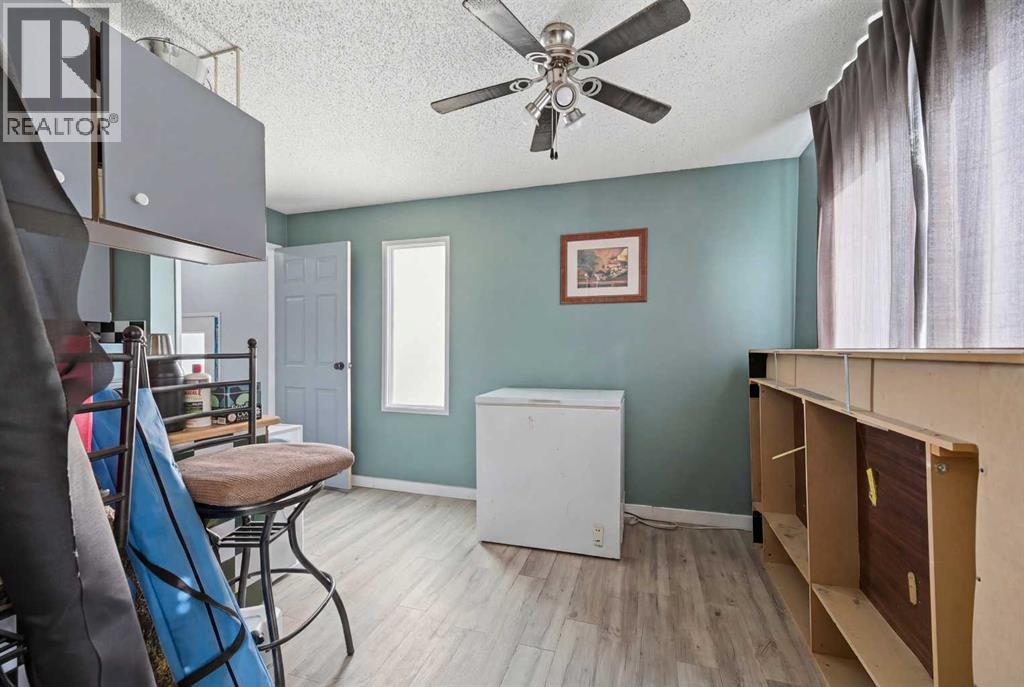 128 Ridgegate Way Sw, Airdrie, Alberta  T4B 1A9 - Photo 5 - A2293079