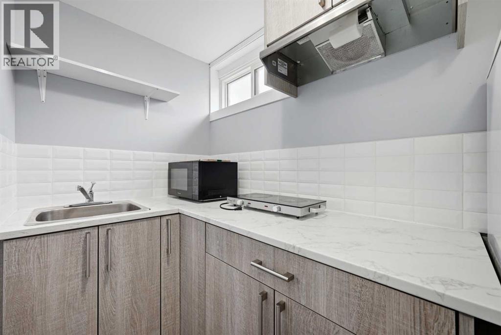 128 Ridgegate Way Sw, Airdrie, Alberta  T4B 1A9 - Photo 27 - A2293079