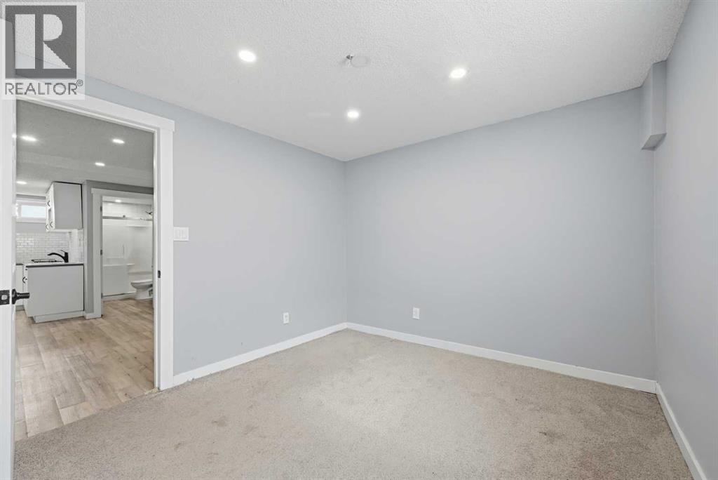 128 Ridgegate Way Sw, Airdrie, Alberta  T4B 1A9 - Photo 20 - A2293079