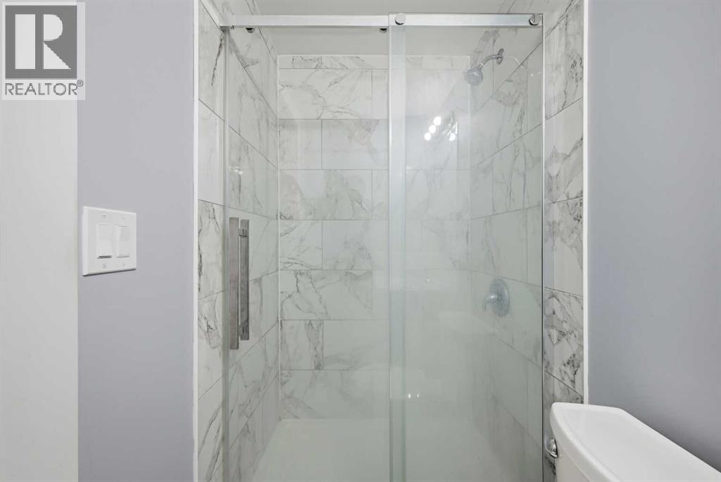 128 Ridgegate Way Sw, Airdrie, Alberta  T4B 1A9 - Photo 29 - A2293079