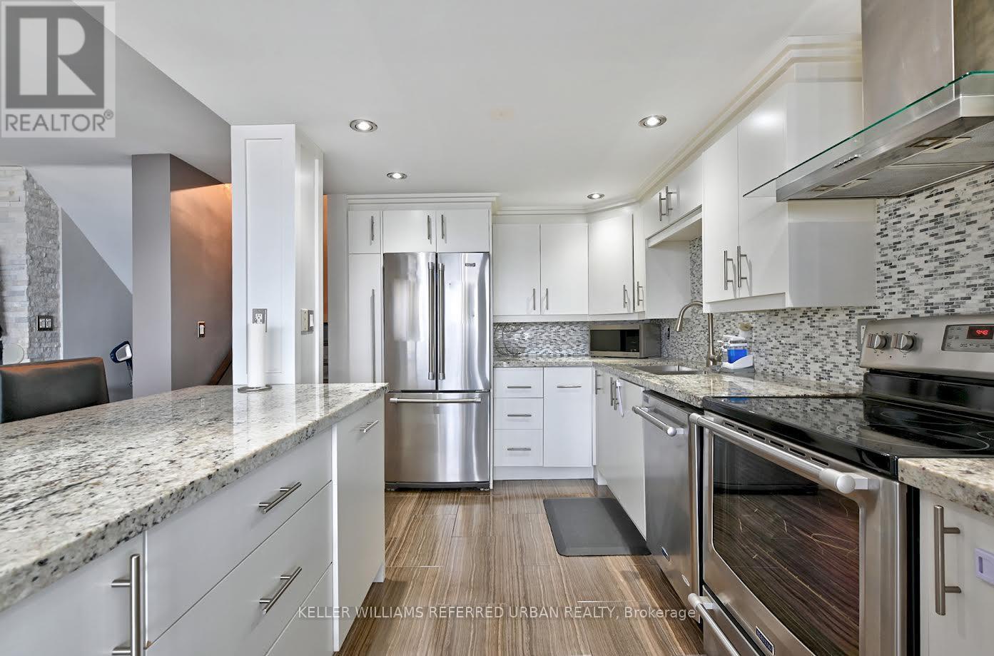 1411 - 11 Wincott Drive, Toronto (Kingsview Village-The Westway), Ontario  M9R 2R9 - Photo 11 - W12889594