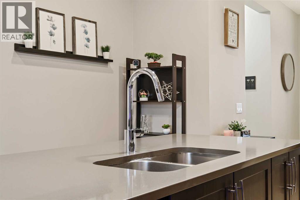 754 Belmont Drive Sw, Calgary, Alberta  T2X 4H4 - Photo 7 - A2287782