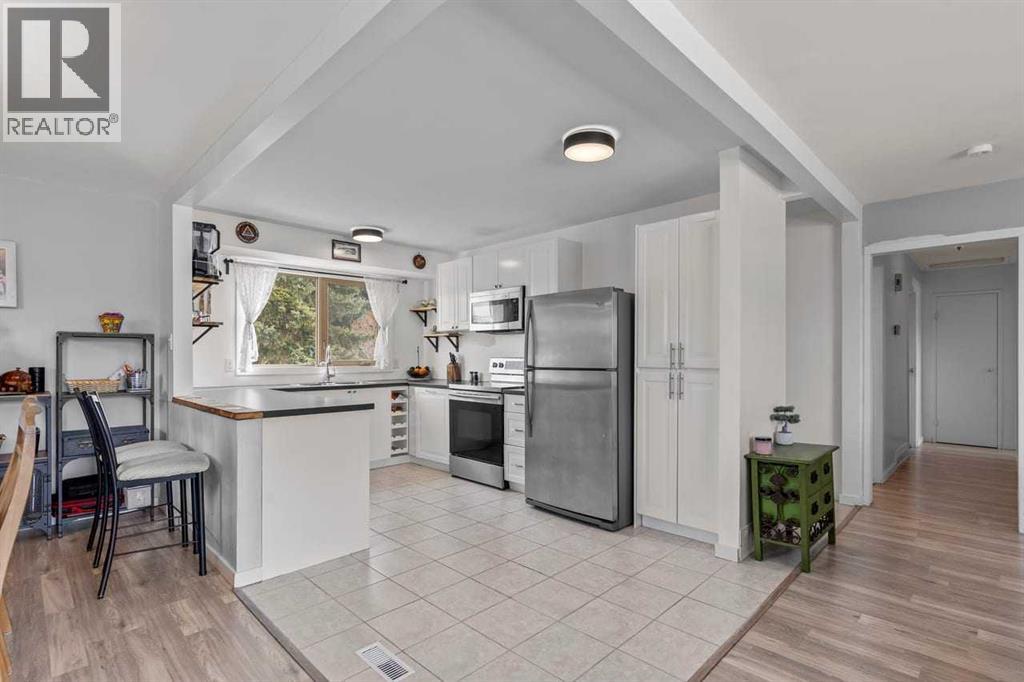 436 Queen Charlotte Road Se, Calgary, Alberta  T2H 4H7 - Photo 5 - A2293139