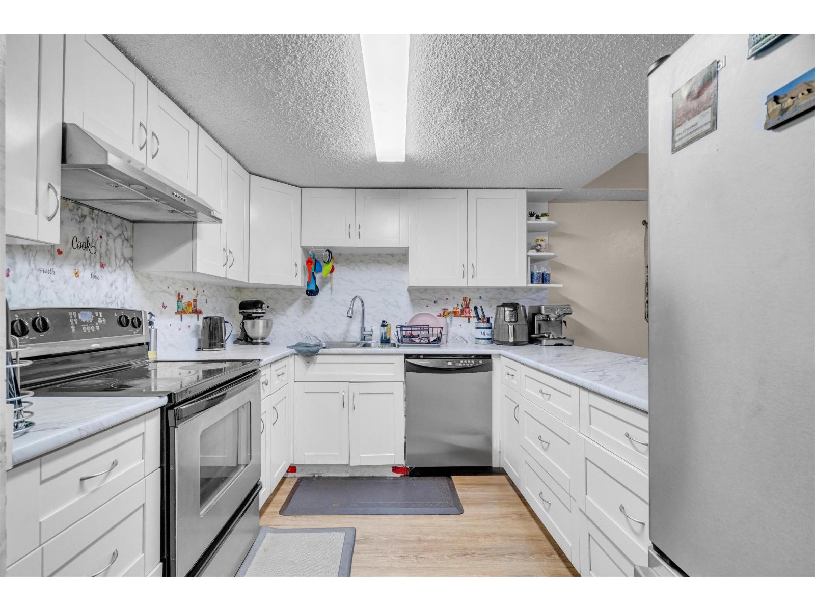 102 7150 133 Street, Surrey, British Columbia  V3W 7Z7 - Photo 12 - R3100304