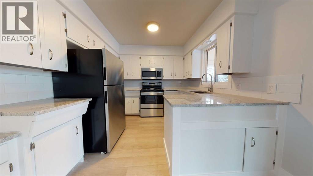 73 Laval Court W, Lethbridge, Alberta  T1K 4G2 - Photo 6 - A2293321