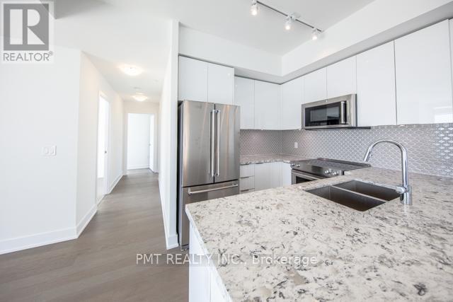 1218 - 30 Shore Breeze Drive, Toronto, Ontario  M8V 0J1 - Photo 3 - W12890222