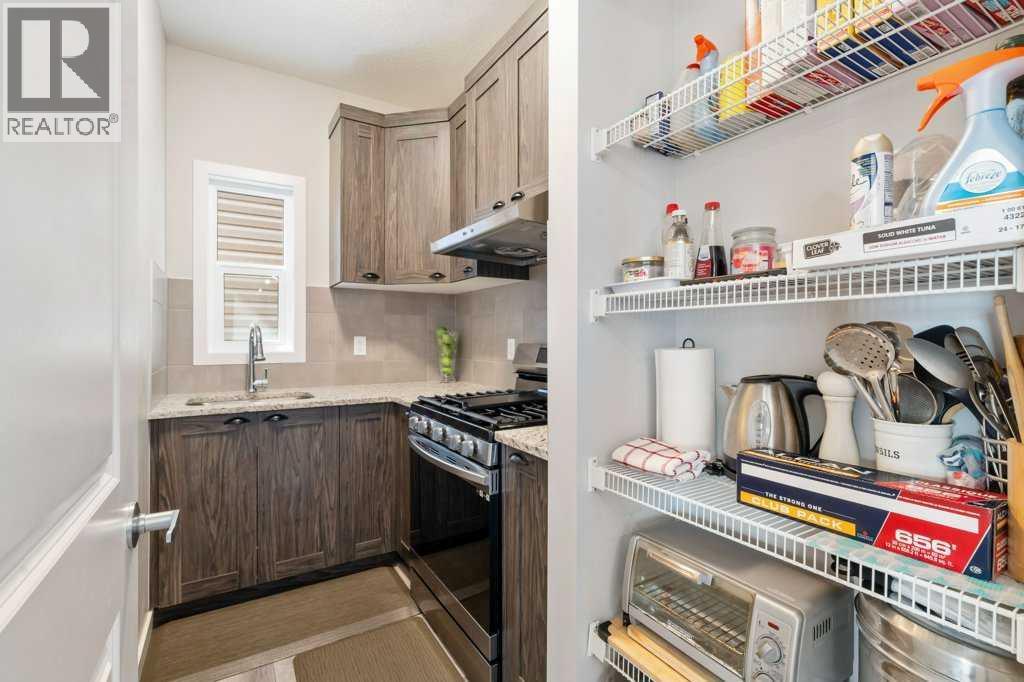 234 Carringsby Way Nw, Calgary, Alberta  T3P 1T5 - Photo 9 - A2286942