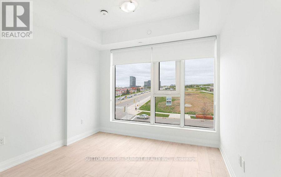 616 - 412 Silver Maple Road, Oakville, Ontario  L6H 7X8 - Photo 5 - W12890404