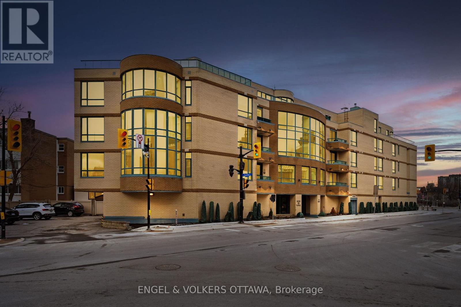 Echo on the Canal at 10 Main Street - an exclusive, quiet residence at the corner of Main and Echo Drive, mere steps from Colonel By and the scenic Rideau Canal. Units in this distinguished building rarely come to market, and discerning buyers take notice when they do. Unit 207 offers over 1,300 sq ft of updated, open-concept living with a layout that is anything but ordinary. The striking curved window anchors the space, flooding the interior with natural light and lending a sense of openness you simply won't find in a typical condo. The kitchen features tasteful cabinetry, quartz countertops, stainless steel appliances, and a spacious island with seating for four. Two generous bedrooms and two full bathrooms - the primary suite includes its own ensuite and access to a private balcony. In-unit laundry, oversized underground parking with bicycle storage, and a private storage locker are all included. The lifestyle is unbeatable - Main Street's cafés and restaurants, skating and kayaking on the Canal, Parliament, museums, parks, and Ottawa's renowned bike path network are all just steps from your door. This is refined urban living at its finest. (id:48254)