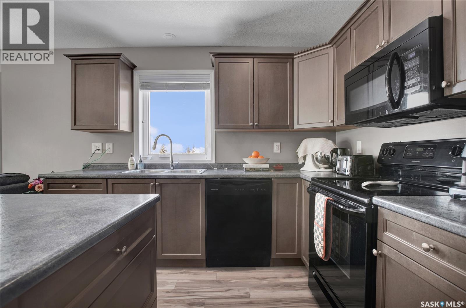 208 923 Kristjanson Road, Saskatoon, Saskatchewan  S7S 0B1 - Photo 4 - SK030515