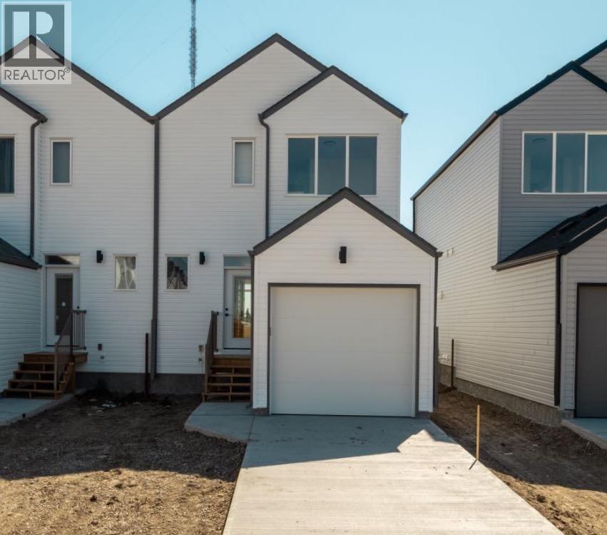 669 Blackwolf Boulevard N, Lethbridge, Alberta  T1H 7H7 - Photo 3 - A2268573