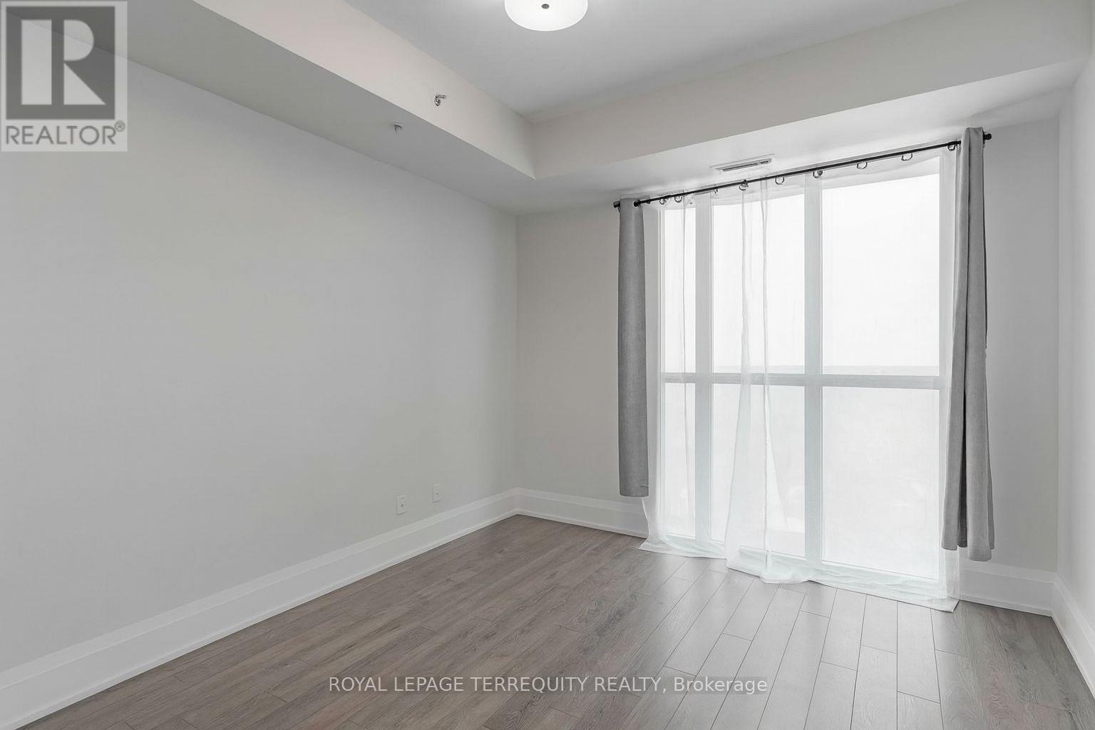 704 - 45 Yorkland Boulevard, Brampton, Ontario  L6P 4B4 - Photo 5 - W12891206