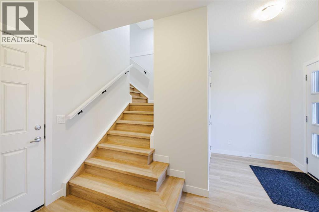 213 Alpine Rush View, Rural Rocky View County, Alberta  T3Z 0E7 - Photo 9 - A2281731