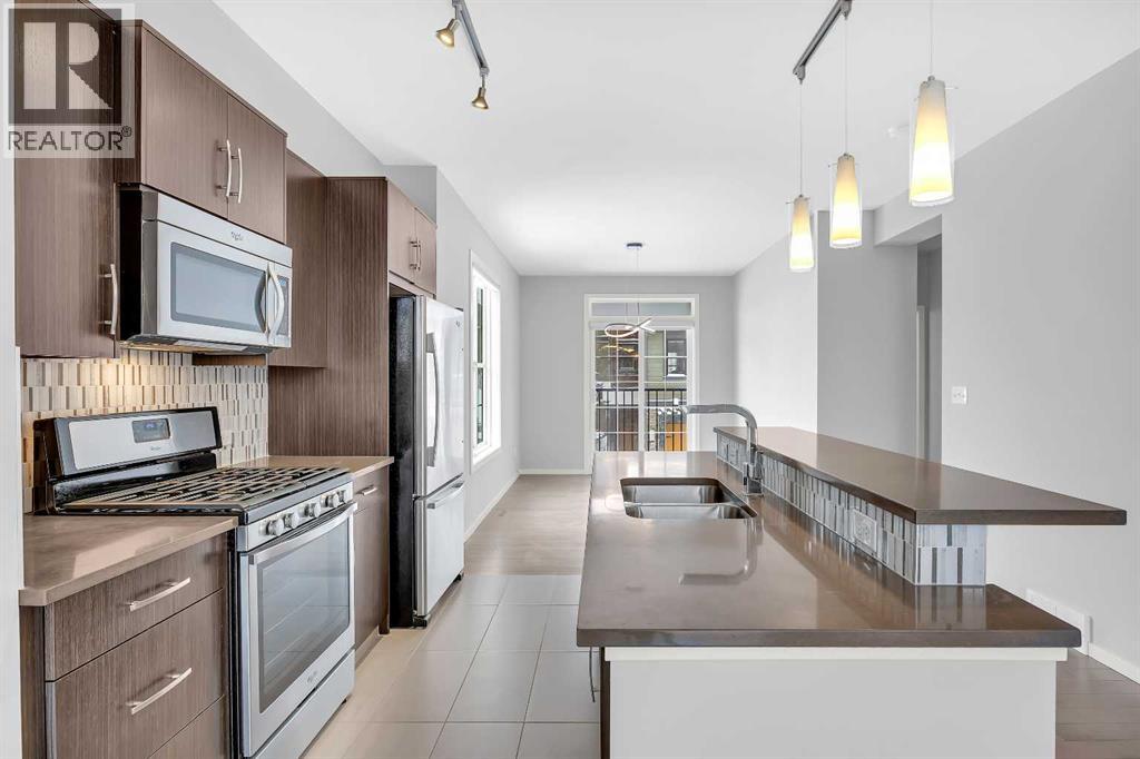 455 Ascot Circle Sw, Calgary, Alberta  T3H 0X3 - Photo 9 - A2287431