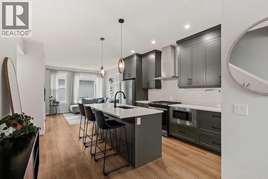 168 Rowmont Boulevard Nw, Calgary, Alberta  T3L 0H3 - Photo 3 - A2292930