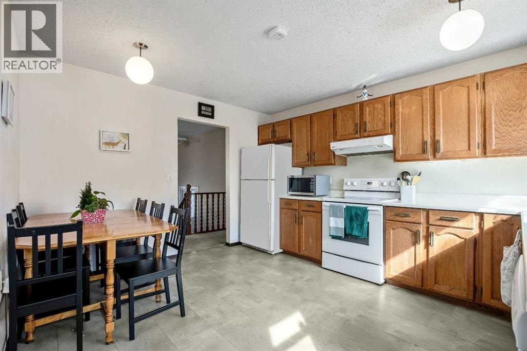 427 Queen Anne Way Se, Calgary, Alberta  T2J 4R8 - Photo 12 - A2292763