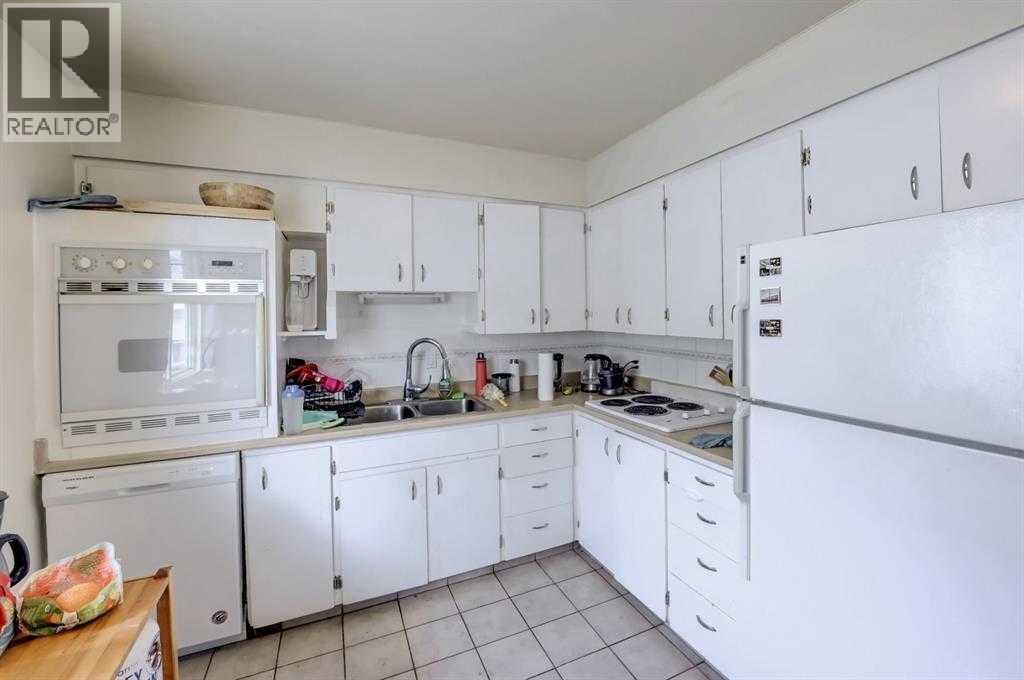 518 54 Avenue Sw, Calgary, Alberta  T2V 0C7 - Photo 5 - A2293717